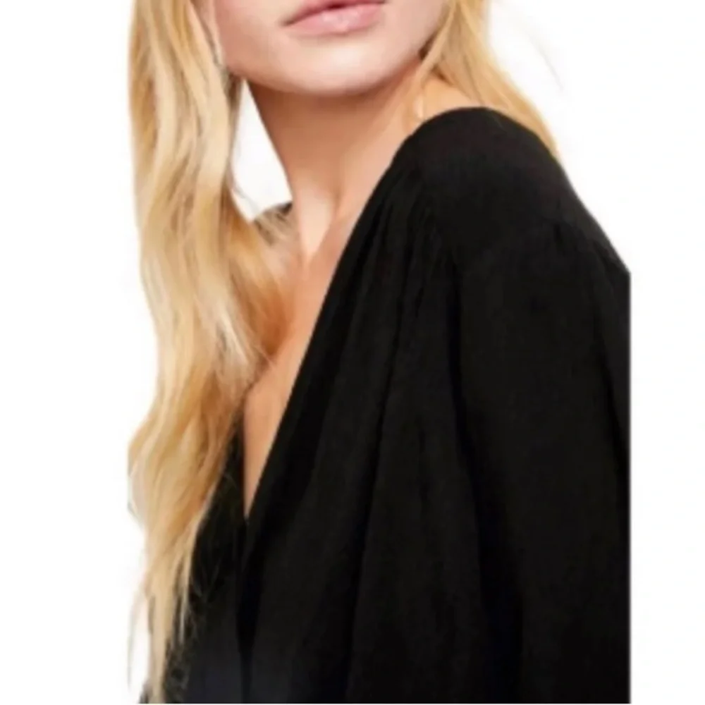 Free people Check it‎ out wrap top. NWOT. Retail 78